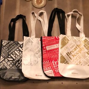 Four Lululemon reusable bags in great condition.